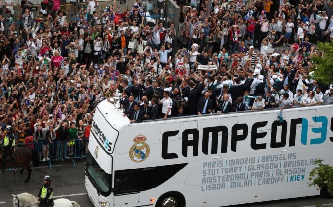 Real Madrid celebrate winning the Champions League Final
