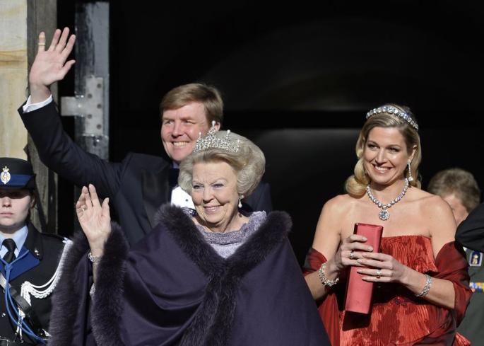 Queen Beatrix of the Netherlands, Crown Prince Willem-Alexander and his wife leave the Royal Palace in Amsterdam