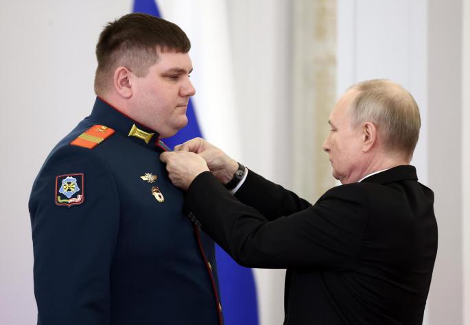 Russian President Putin presents Gold Star medals to the Heroes of Russia in Moscow