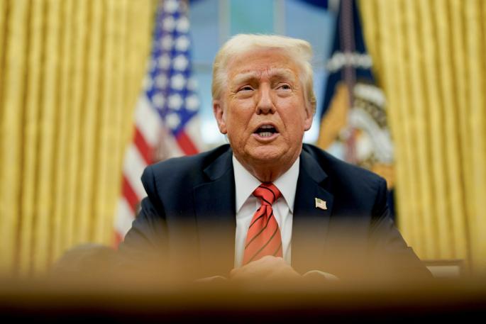 US President Trump signs executive order in Oval Office