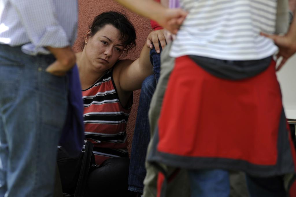 A relative of one of the victims of a train crash reacts in Santiago de Compostela