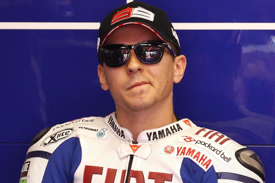 Yamaha MotoGP rider Lorenzo of Spain looks on before the start of the first practice session during the Italian motorcycling Gra