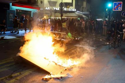 People protest against the French far-right Rassemblement National party, following partial results in the first round of the ea