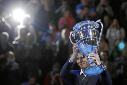 Spain's Rafael Nadal holds the ATP World number one trophy during the ATP World Tour Finals in London